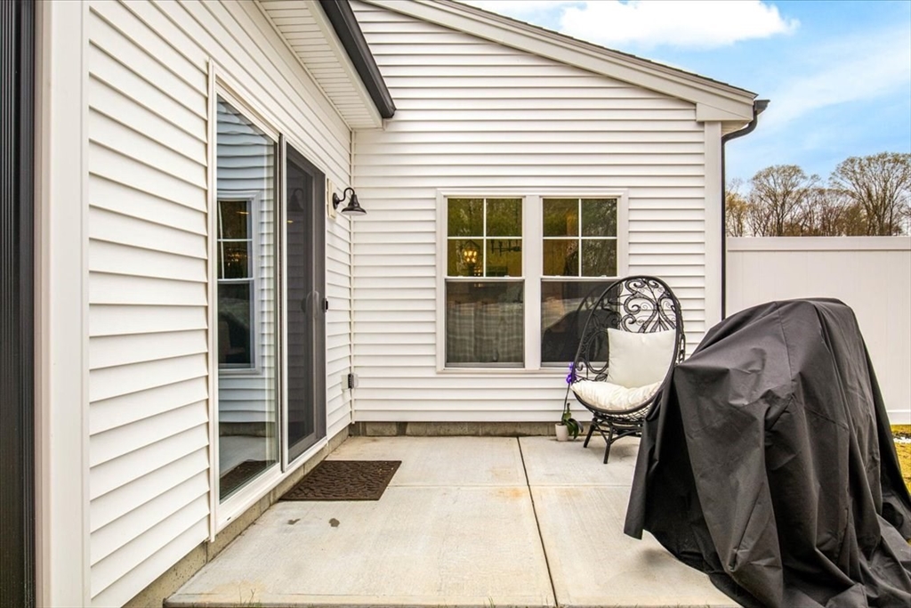 9 Iris Lane Bellingham, MA 02019 - Photo 33 of 34 a view of a two chairs in the balcony
