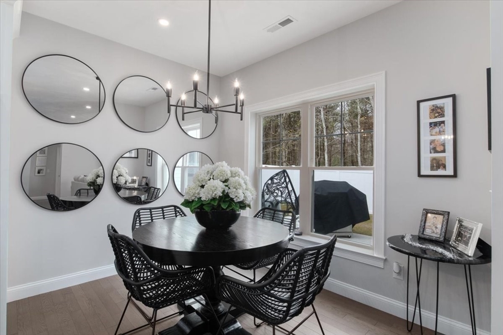 9 Iris Lane Bellingham, MA 02019 - Photo 10 of 34 a dining room with furniture and window
