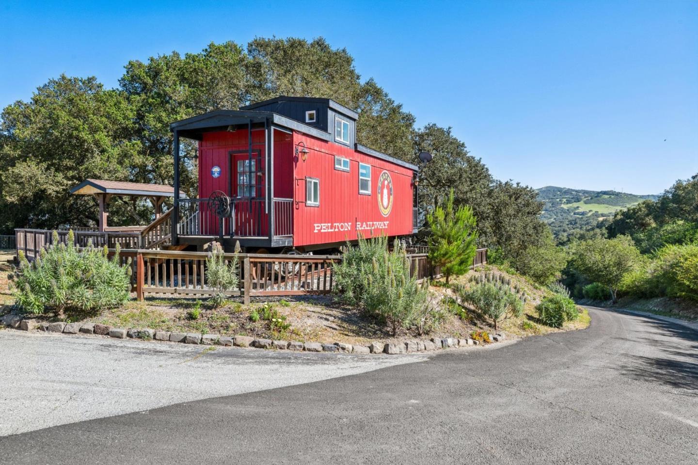 26245 Rinconada Drive Carmel Valley, CA 93924 - Photo 19 of 19 a front view of a house with a yard