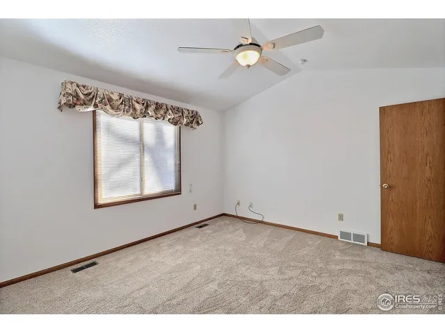 a view of an empty room with window