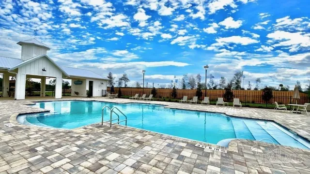 a view of a house with swimming pool