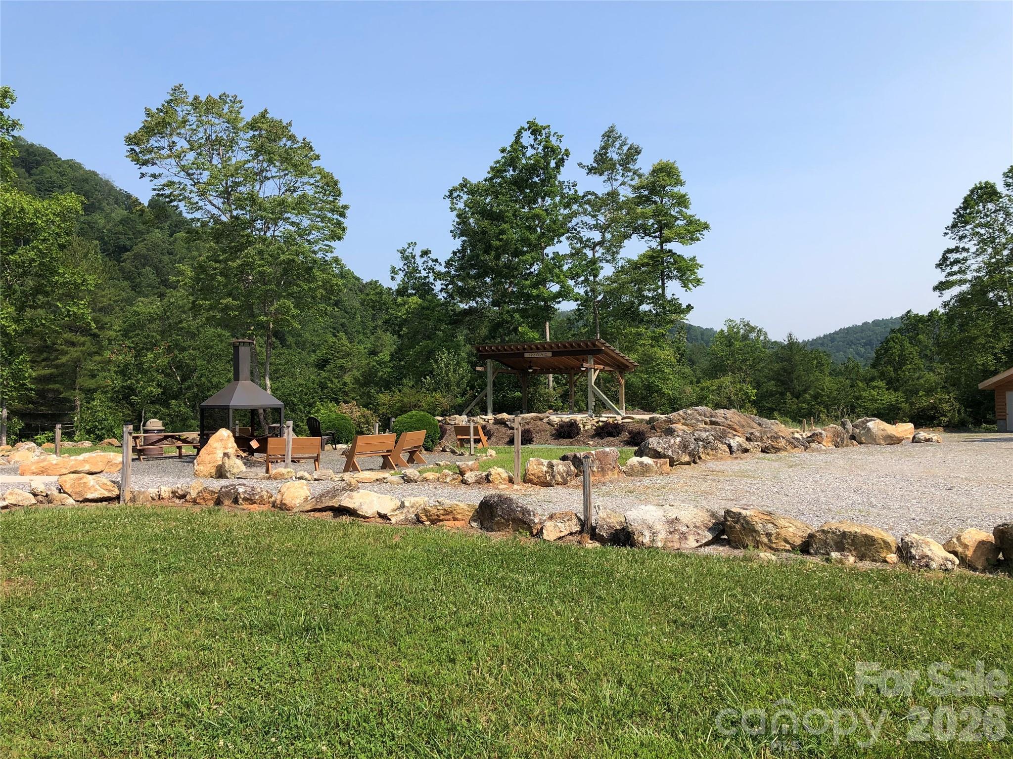 Tbd Staghorn Road, Unit 51 & 52A Purlear, NC 28665 - Photo 45 of 47 a group of cars parked in the middle of a park