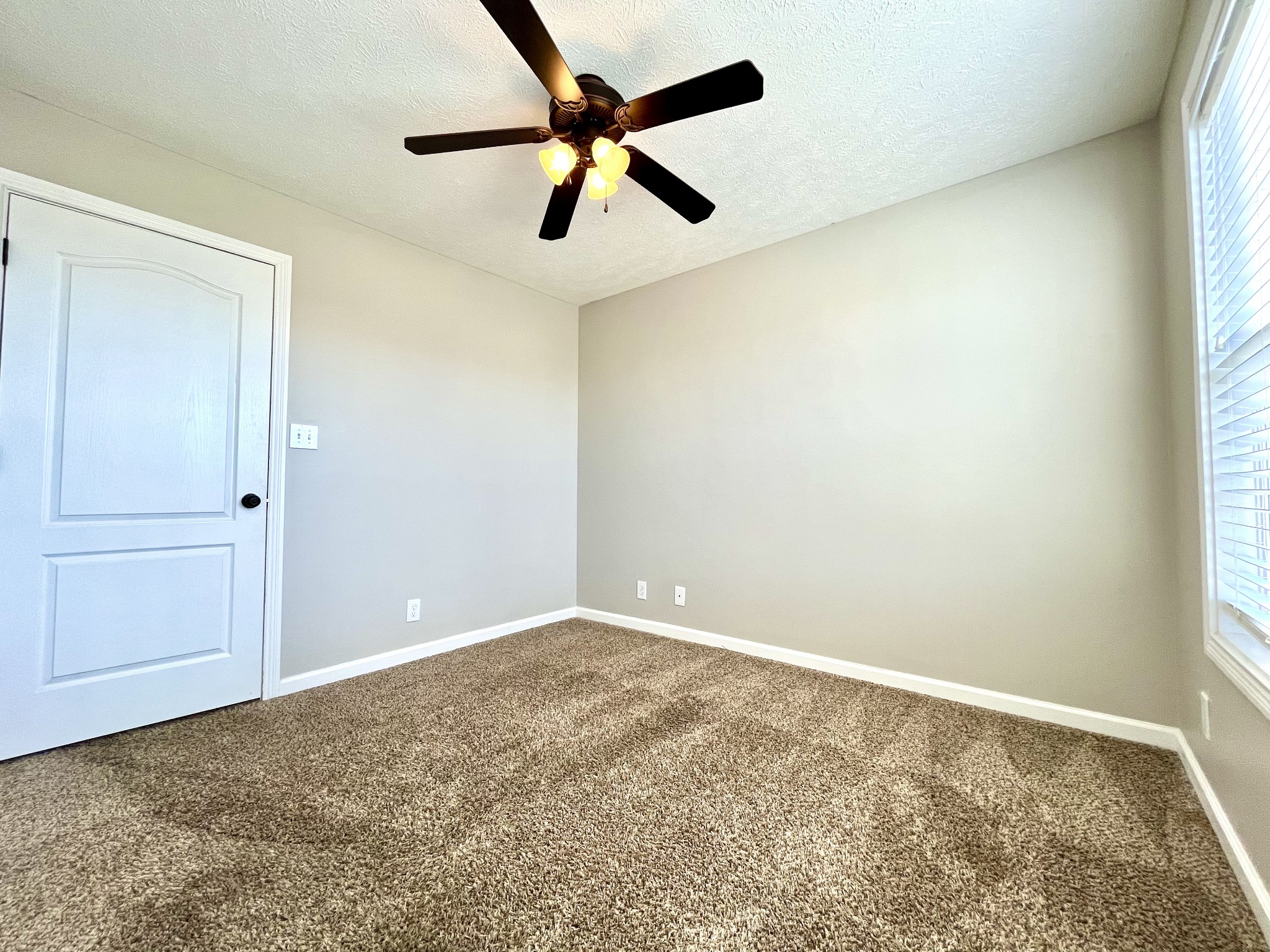 3773 Suiter Road Clarksville, TN 37040 - Photo 12 of 25 an empty room with fan