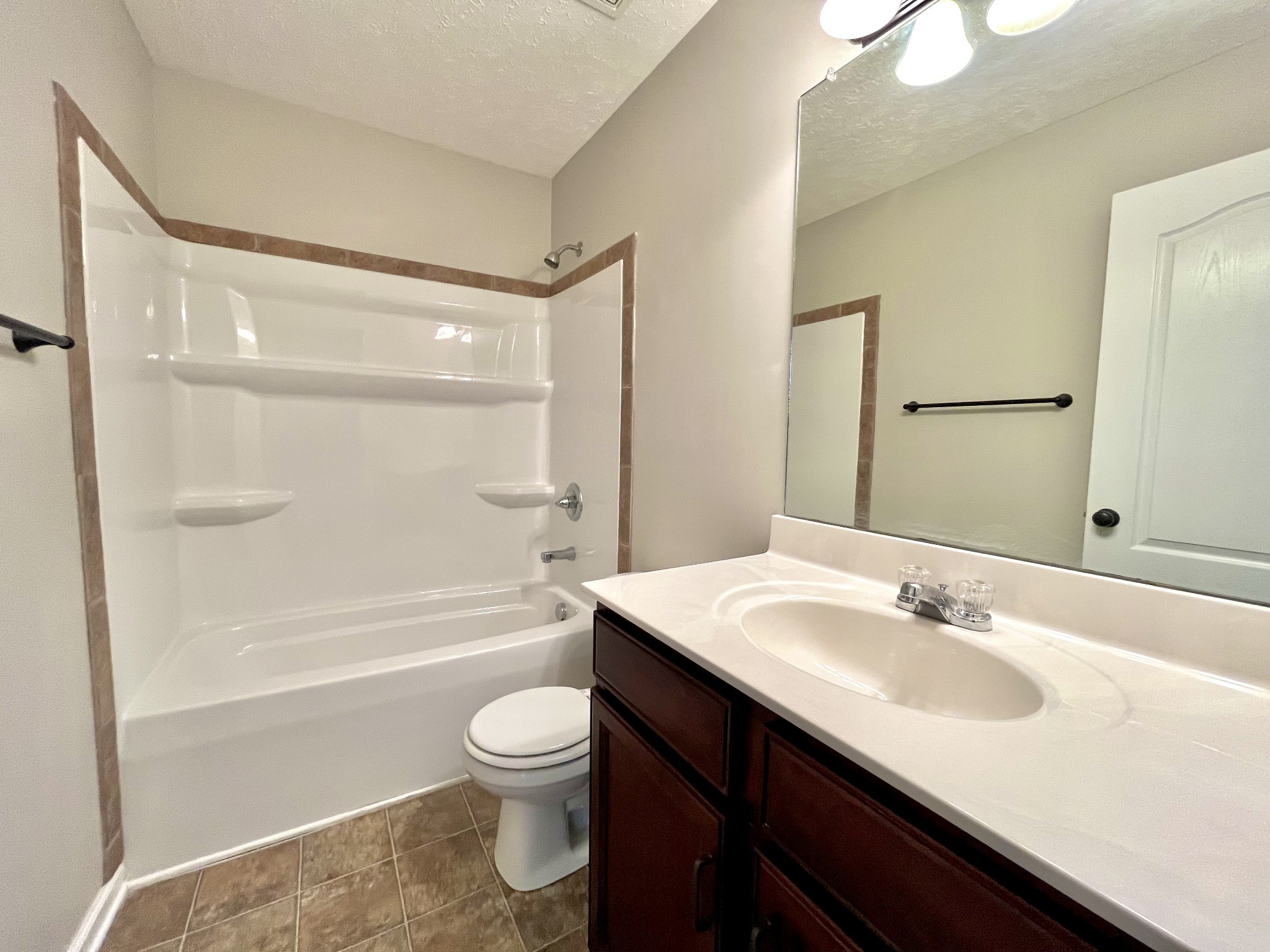 3773 Suiter Road Clarksville, TN 37040 - Photo 13 of 25 a bathroom with a sink a toilet and a bathtub