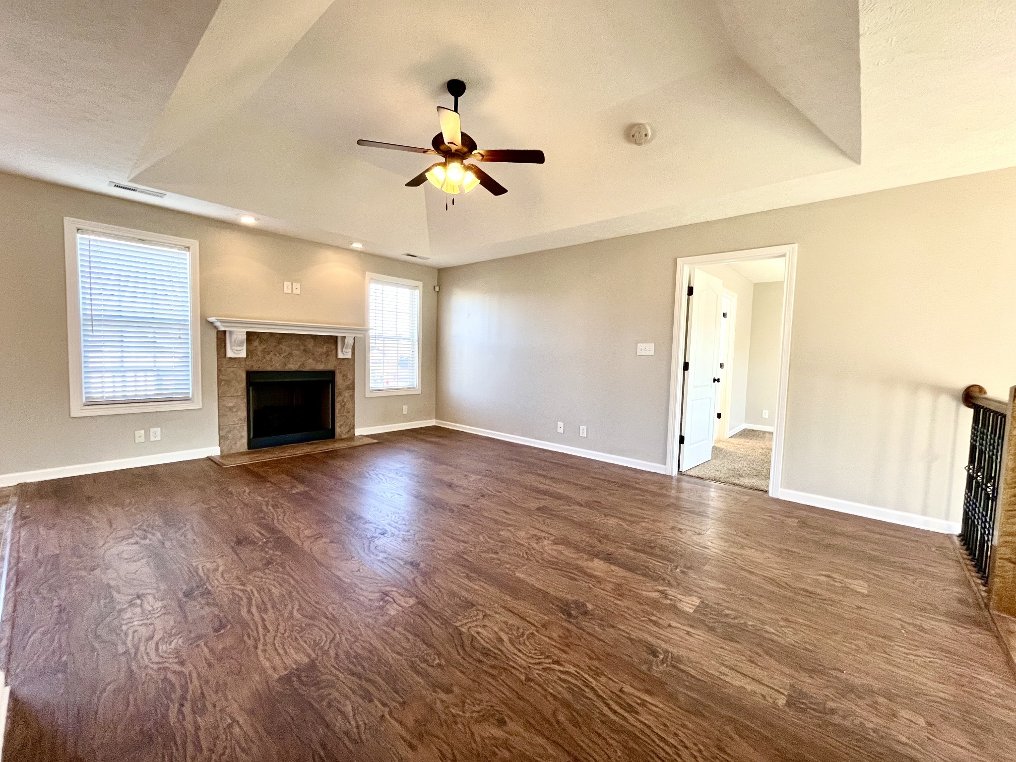 3773 Suiter Road Clarksville, TN 37040 - Photo 16 of 25 a view of an empty room with a fireplace and a window