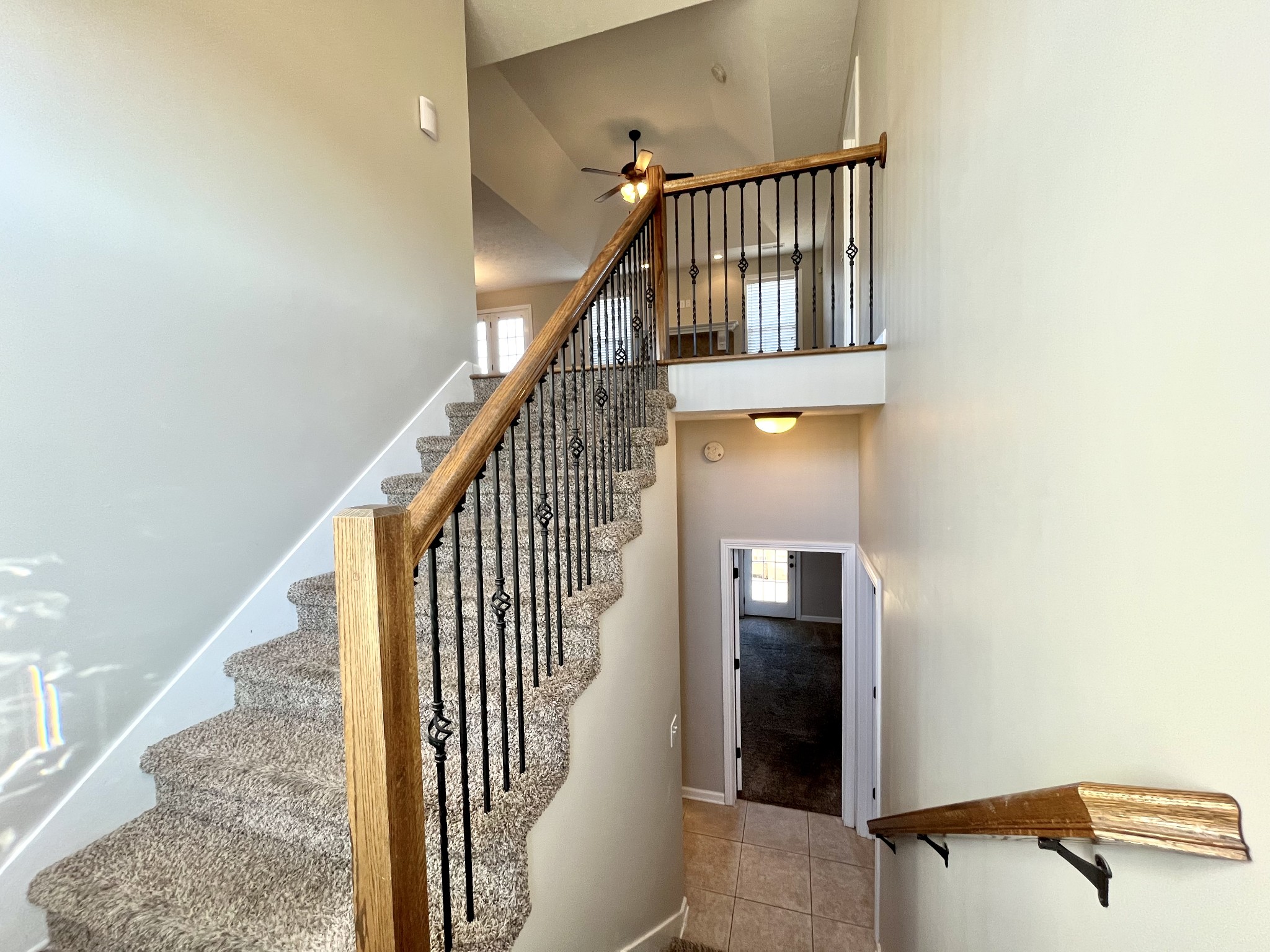 3773 Suiter Road Clarksville, TN 37040 - Photo 17 of 25 a view of staircase with railing and white walls