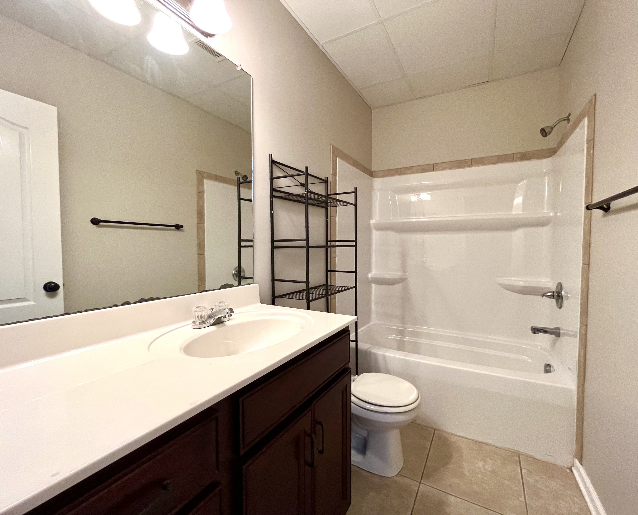 3773 Suiter Road Clarksville, TN 37040 - Photo 19 of 25 a bathroom with a sink a toilet and shower