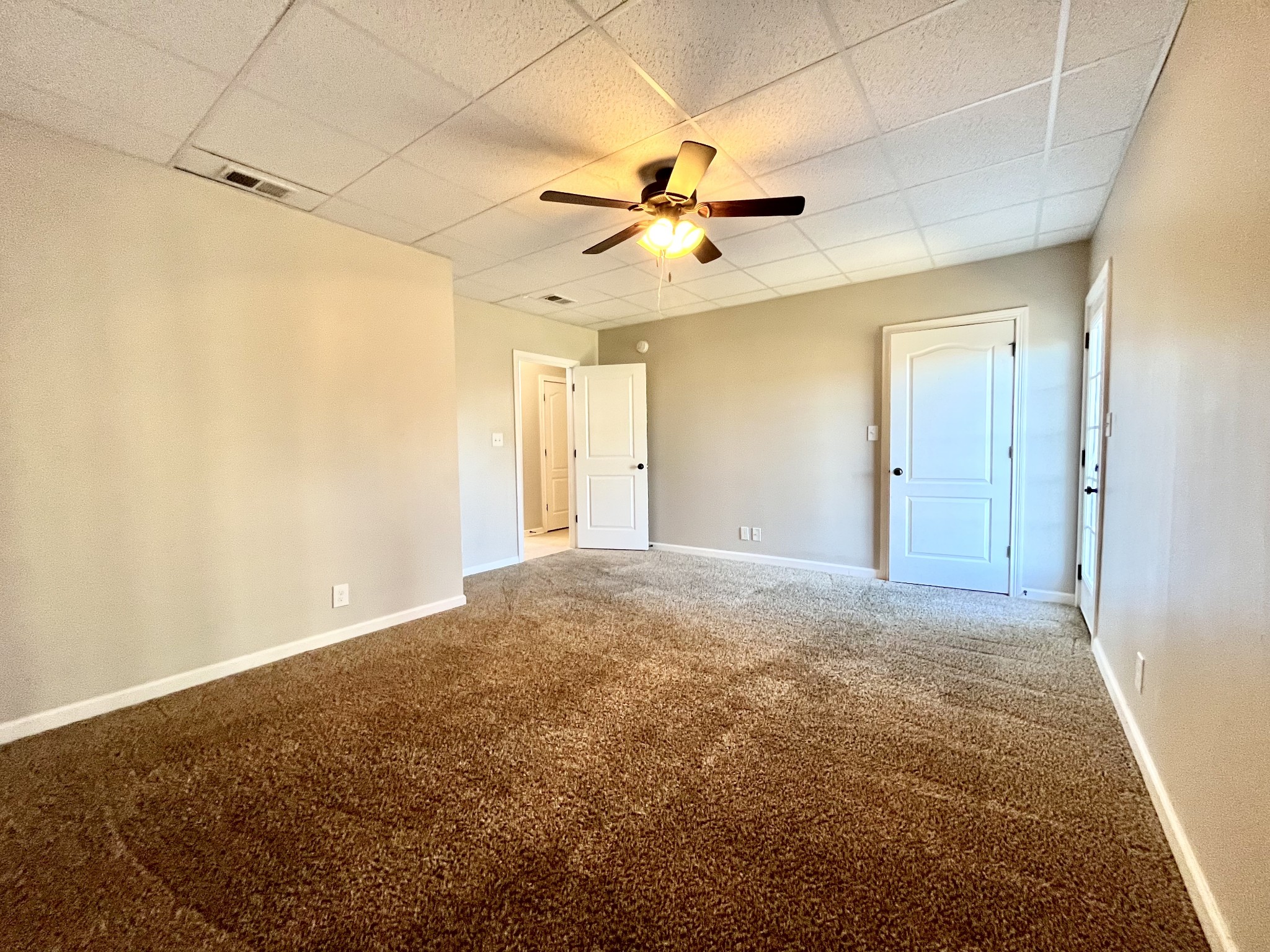 3773 Suiter Road Clarksville, TN 37040 - Photo 22 of 25 a view of a big room with a ceiling fan