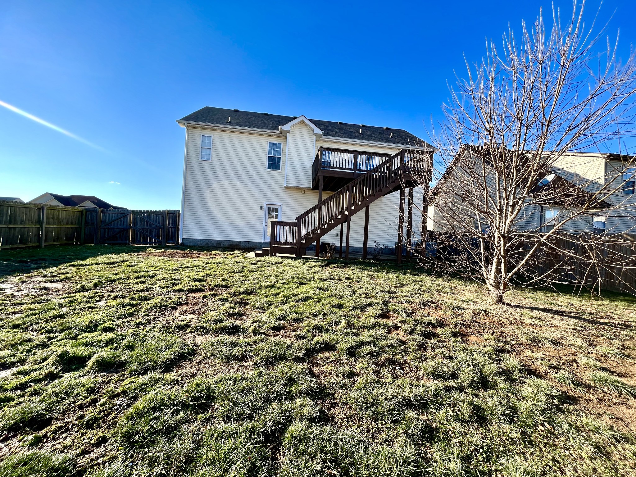 3773 Suiter Road Clarksville, TN 37040 - Photo 25 of 25 a backyard of a house with lots of green space