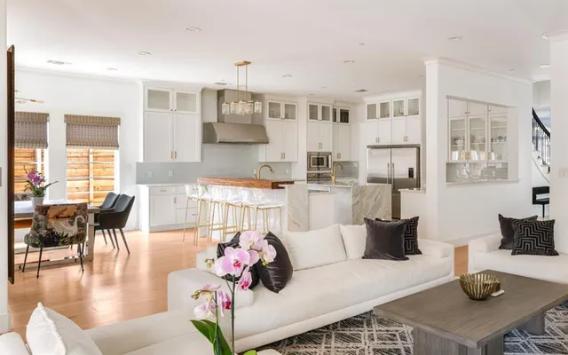 a living room with furniture and a table