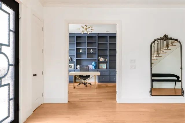 a view of a workspace with furniture