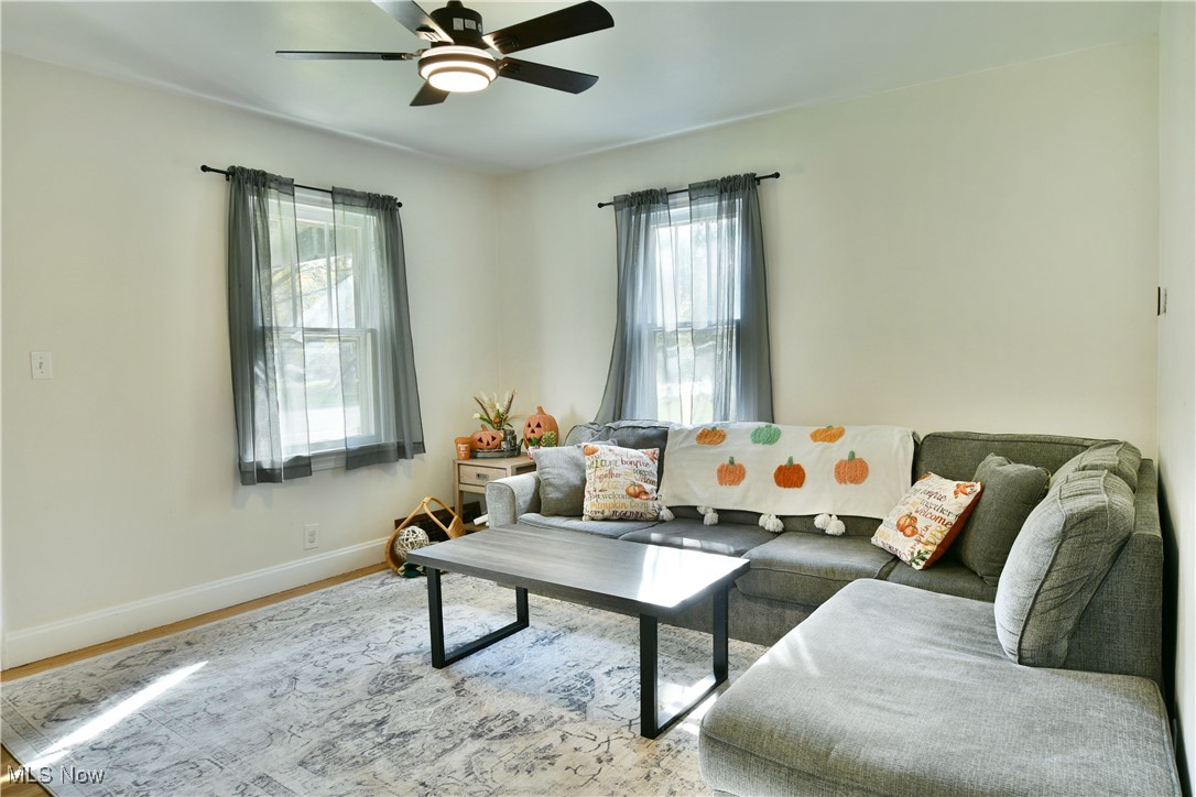 572 Howland Wilson Road Southeast Warren, OH 44484 - Photo 21 of 50 Living room with hardwood / wood-style floors and ceiling fan