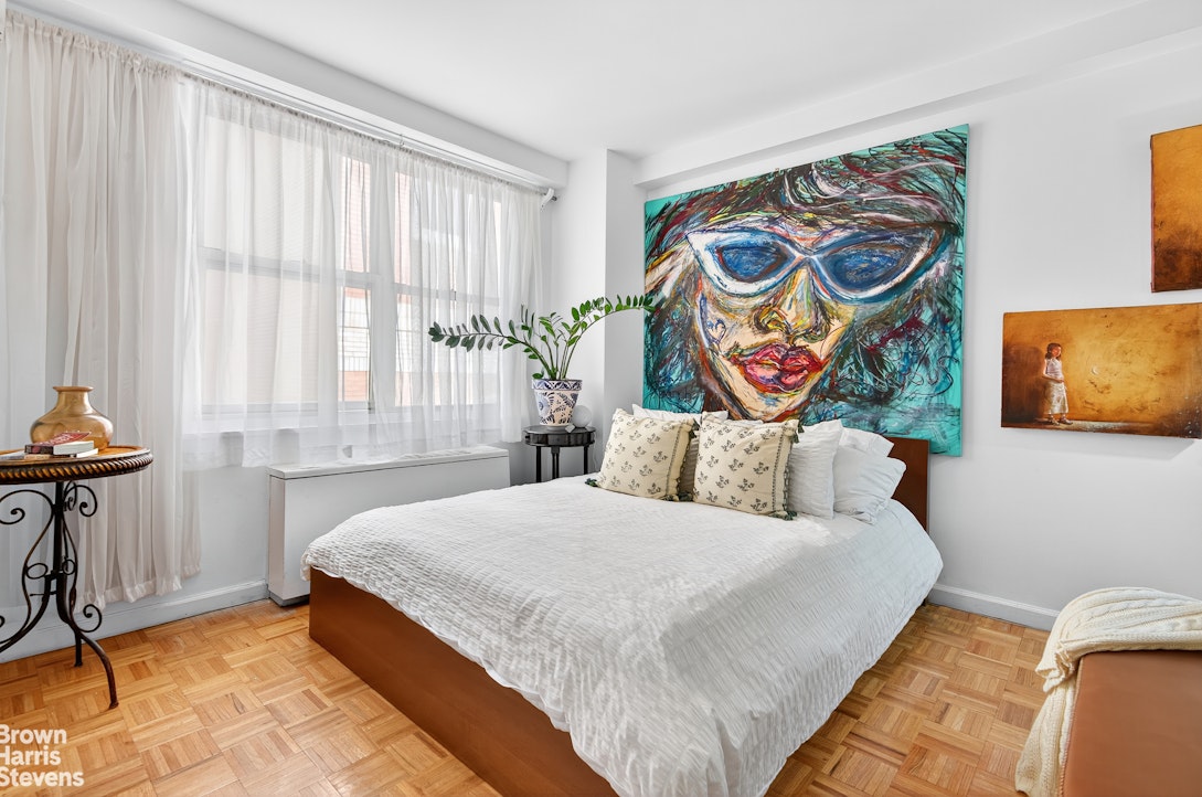 520 East 72nd Street, Unit 3R Manhattan, NY 10021 - Photo 3 of 16 a bedroom with a bed and a window