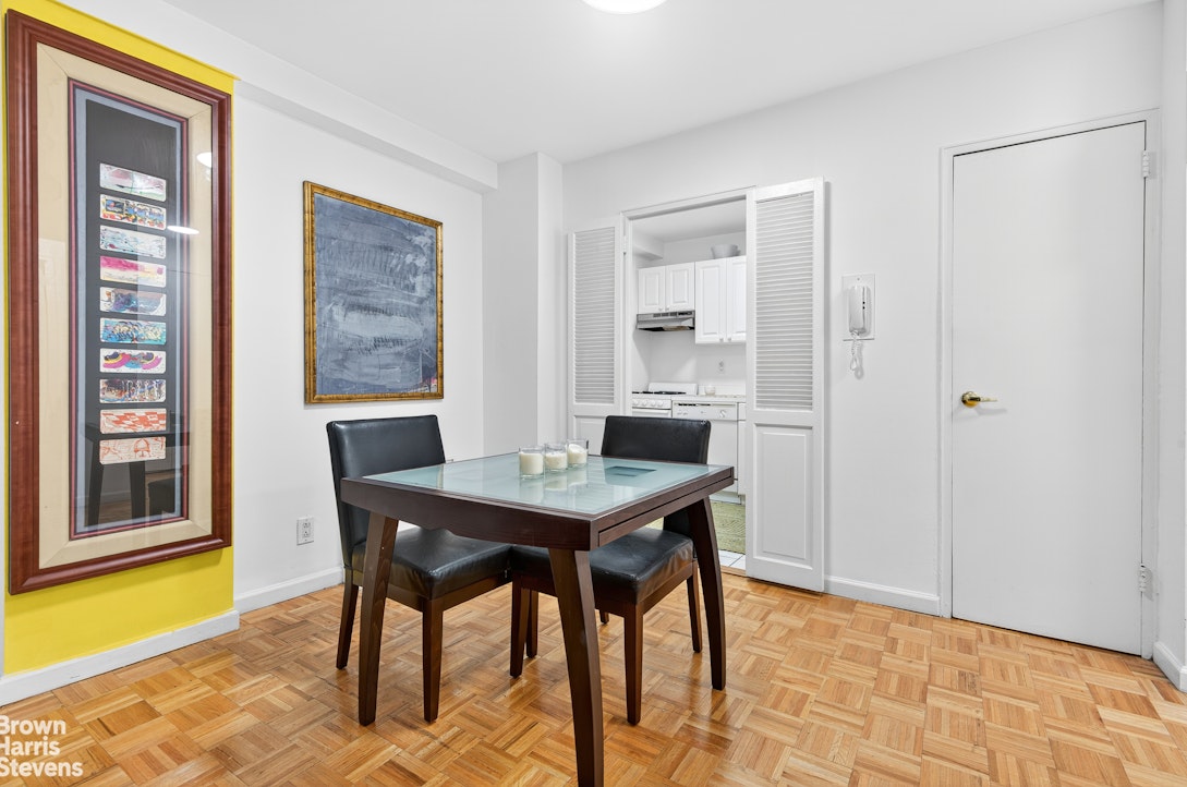 520 East 72nd Street, Unit 3R Manhattan, NY 10021 - Photo 5 of 16 a view of a dining room with furniture and window
