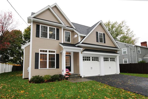 59 Kilburn Road Newton, MA 02465 - Photo 1 of 21 a front view of a house with a yard