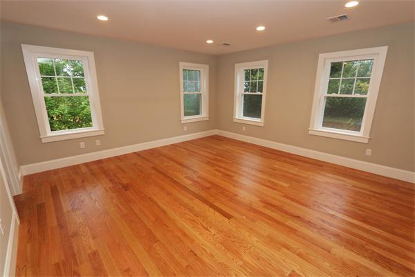 59 Kilburn Road Newton, MA 02465 - Photo 11 of 21 an empty room with wooden floor and windows