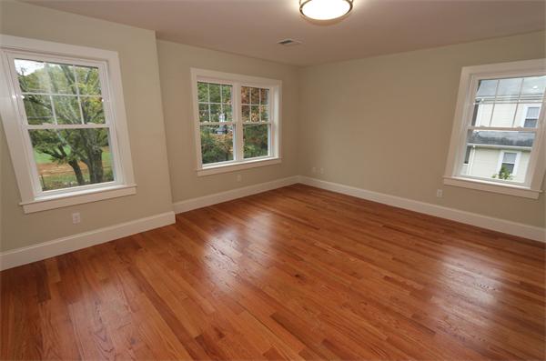 59 Kilburn Road Newton, MA 02465 - Photo 14 of 21 a view of an empty room with wooden floor and a window