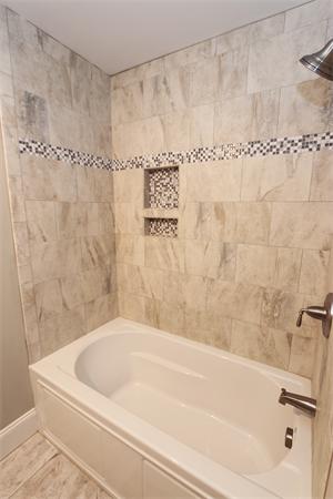 59 Kilburn Road Newton, MA 02465 - Photo 17 of 21 a bathroom with a bathtub