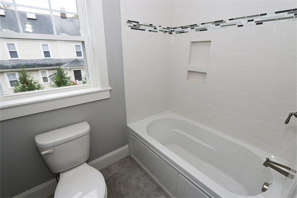 59 Kilburn Road Newton, MA 02465 - Photo 18 of 21 a bathroom with a toilet and a shower