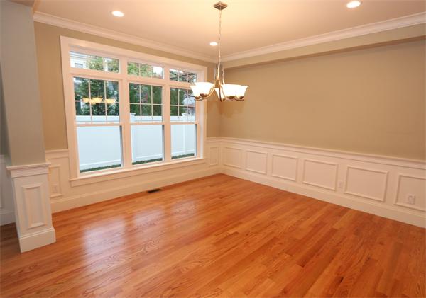59 Kilburn Road Newton, MA 02465 - Photo 8 of 21 a view of an empty room with wooden floor and a window