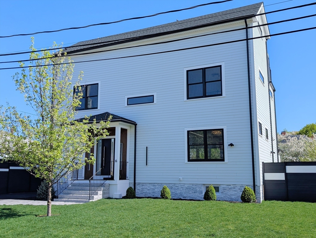 6 Gordon Road, Unit 6 Arlington, MA 02474 - Photo 40 of 40 a front view of a house with garden
