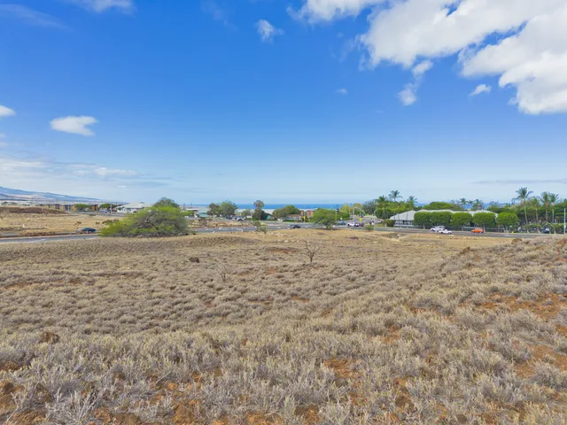 a view of a room next to a yard