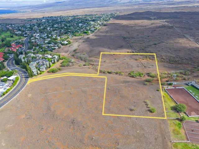 a view of a backyard of a house