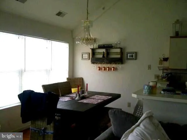 a view of a workspace with furniture