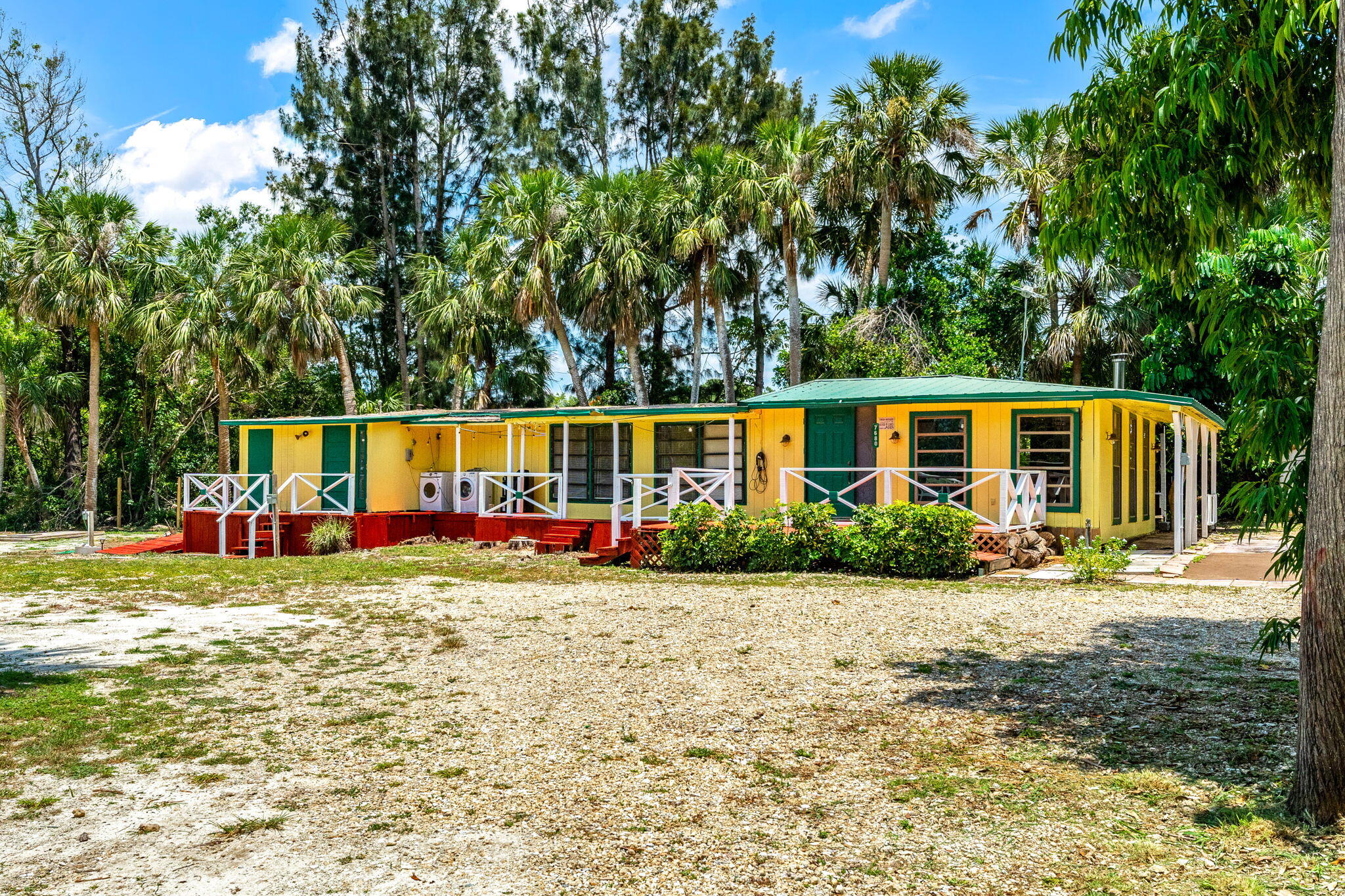 7680 Highway 1 Micco, FL 32976 - Photo 15 of 84 a view of a house with backyard and garden