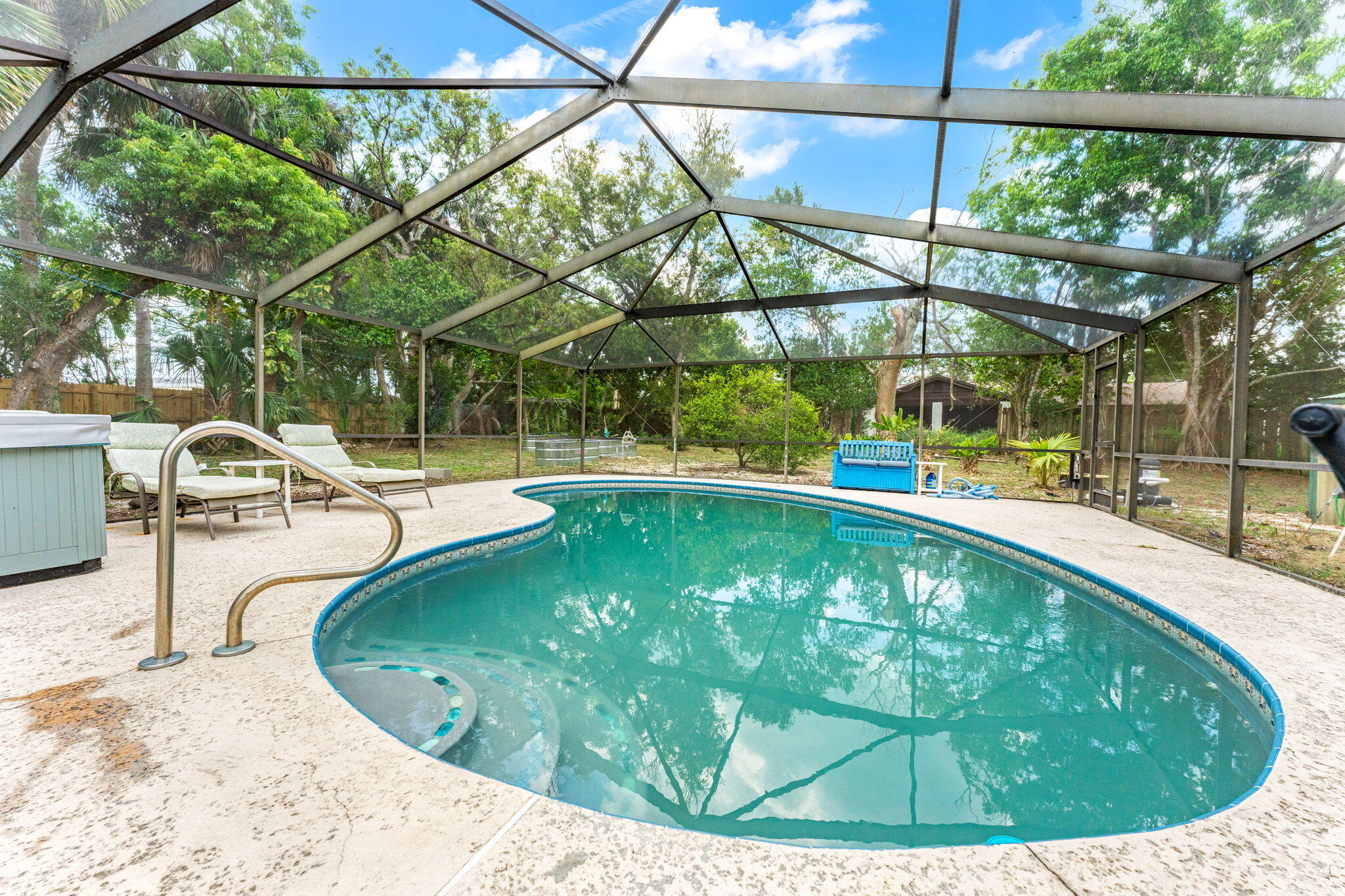 7680 Highway 1 Micco, FL 32976 - Photo 21 of 84 a view of a swimming pool with a patio and swimming pool