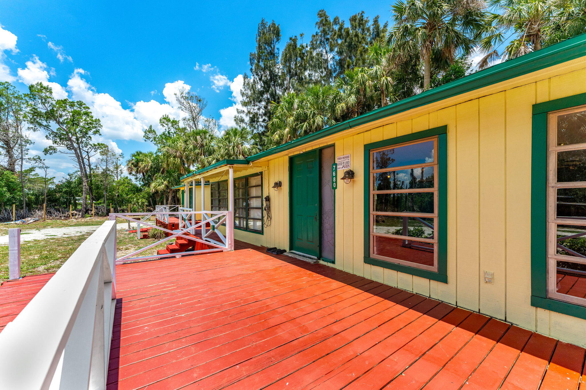 7680 Highway 1 Micco, FL 32976 - Photo 22 of 84 a view of a backyard with couches and deck