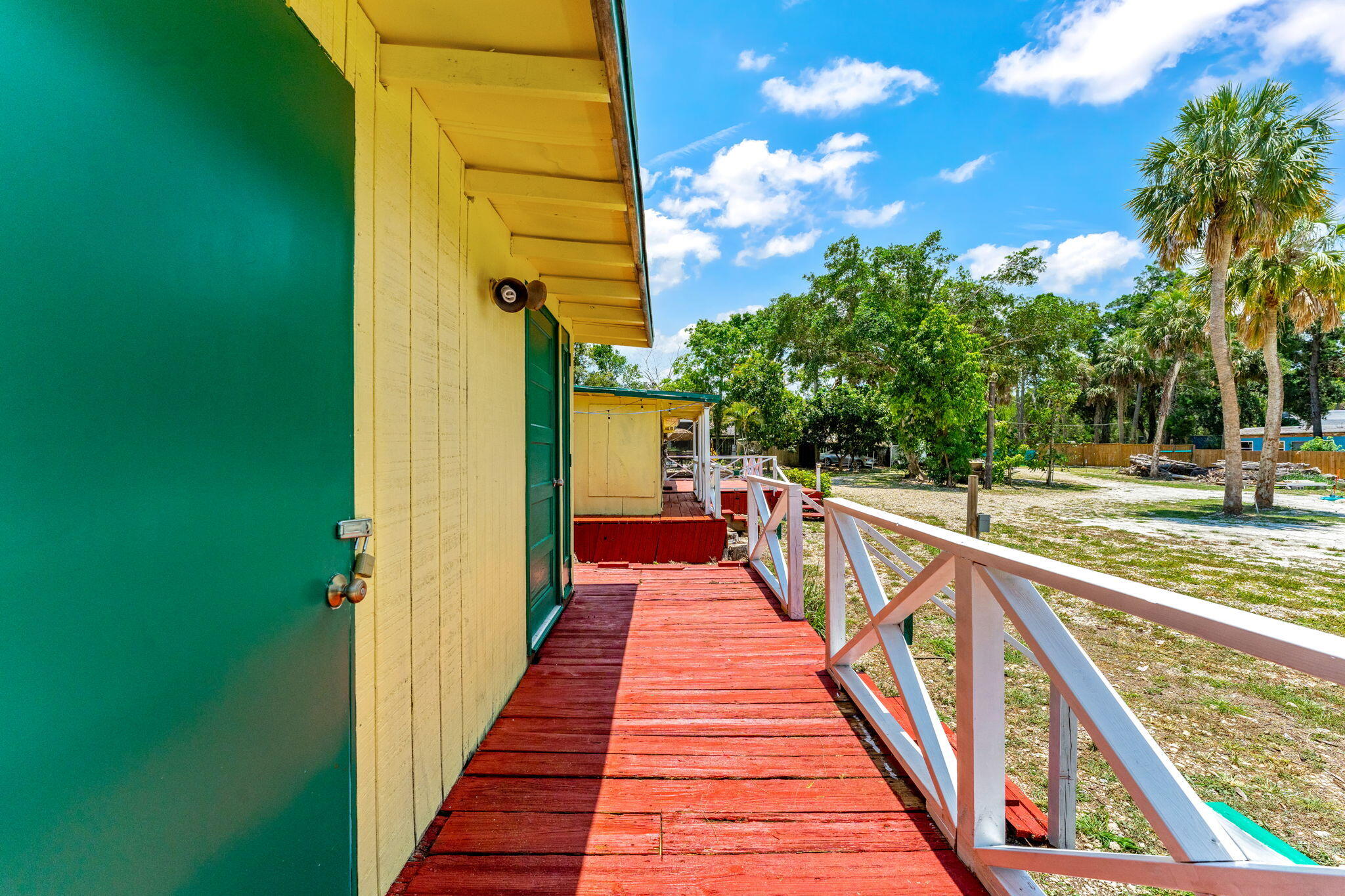 7680 Highway 1 Micco, FL 32976 - Photo 26 of 84 a view of a balcony with wooden floor