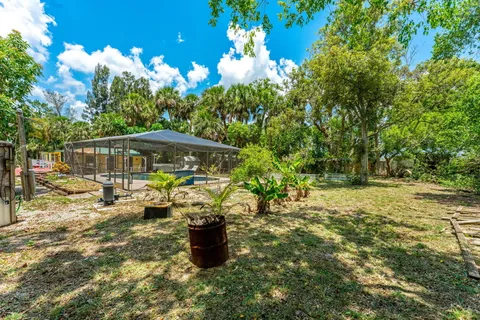 a bathroom with a bathtub and a window