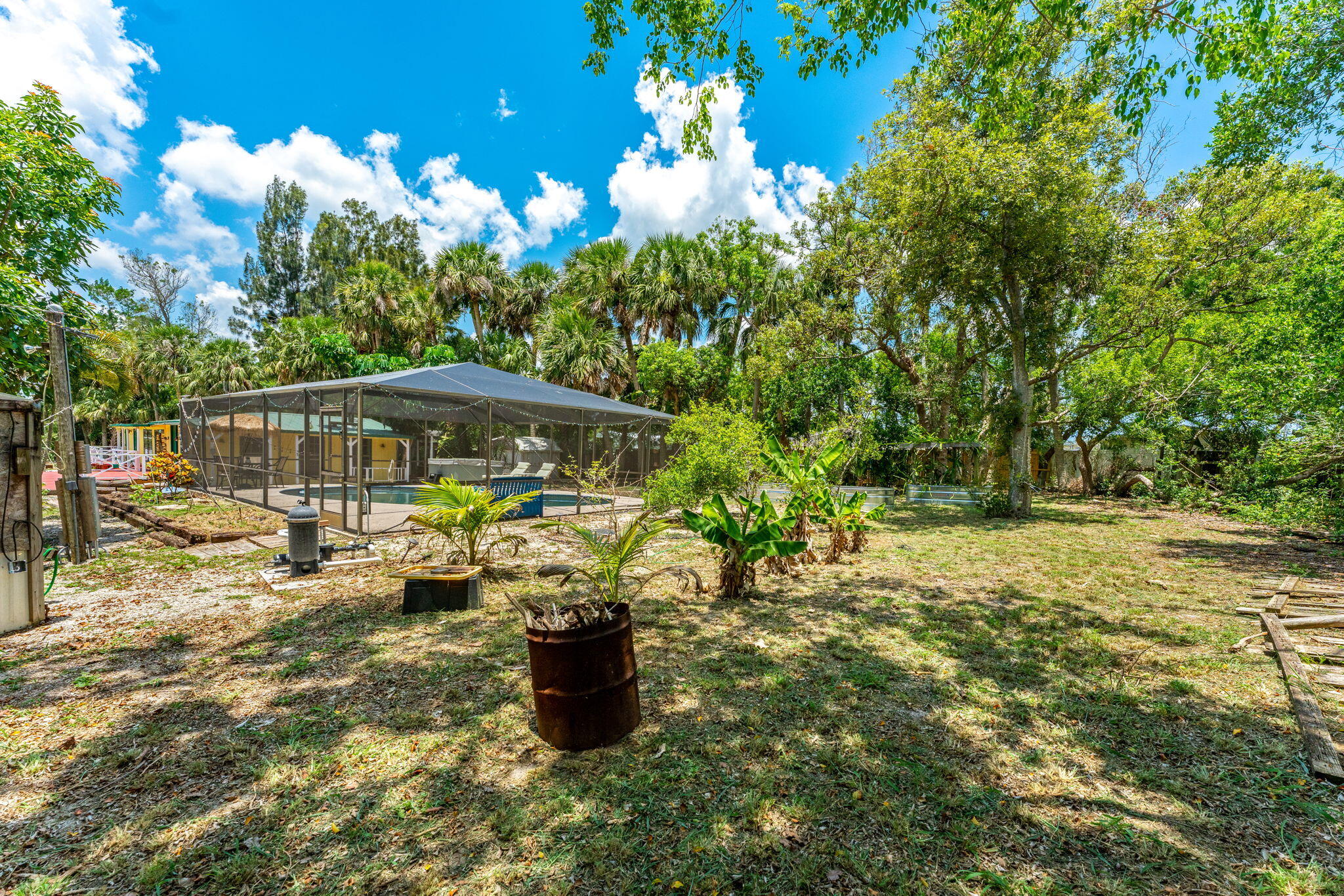 7680 Highway 1 Micco, FL 32976 - Photo 36 of 84 a view of a house with backyard sitting area and garden