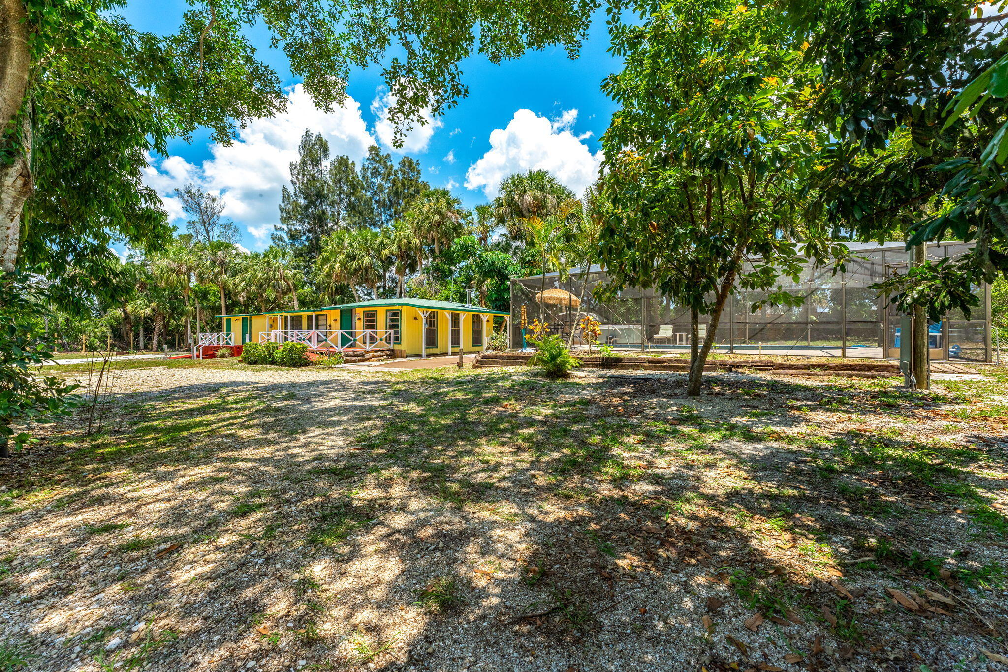 7680 Highway 1 Micco, FL 32976 - Photo 37 of 84 a view of a house with a yard