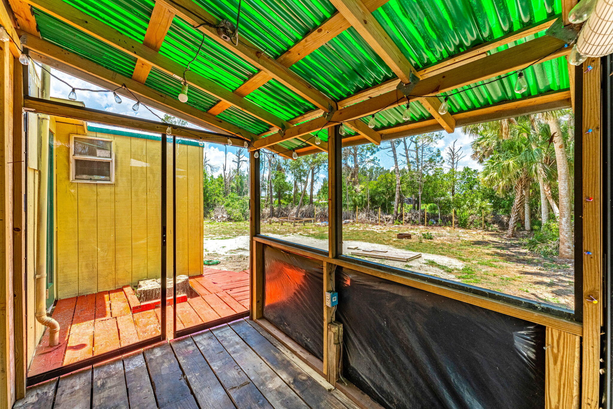 7680 Highway 1 Micco, FL 32976 - Photo 45 of 84 a view of a room with wooden floor and furniture