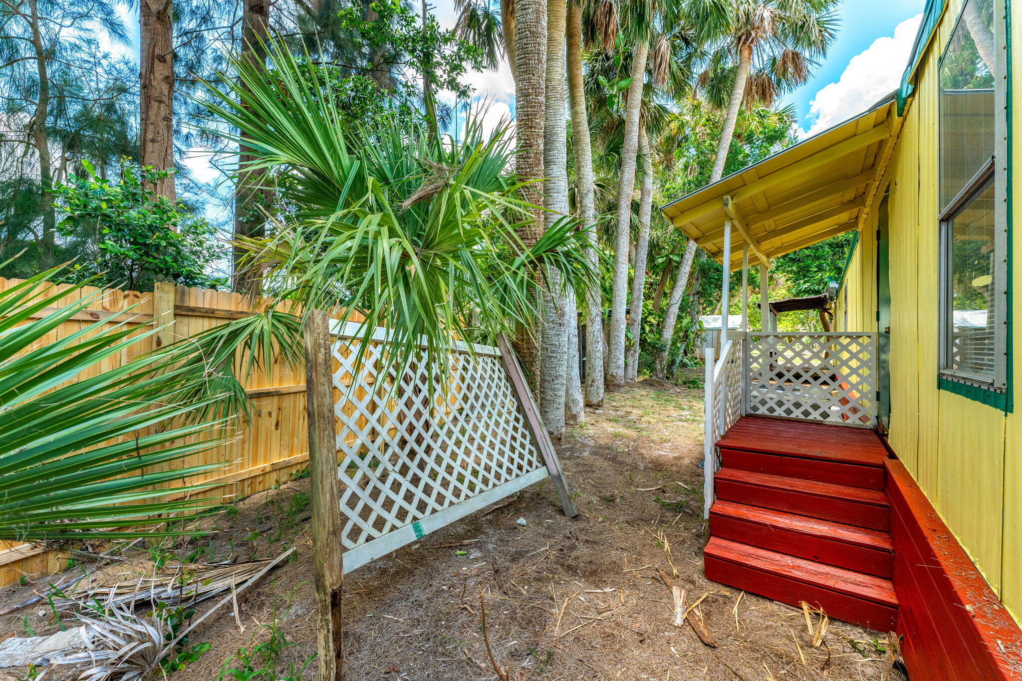 7680 Highway 1 Micco, FL 32976 - Photo 47 of 84 a front view of a house with a yard