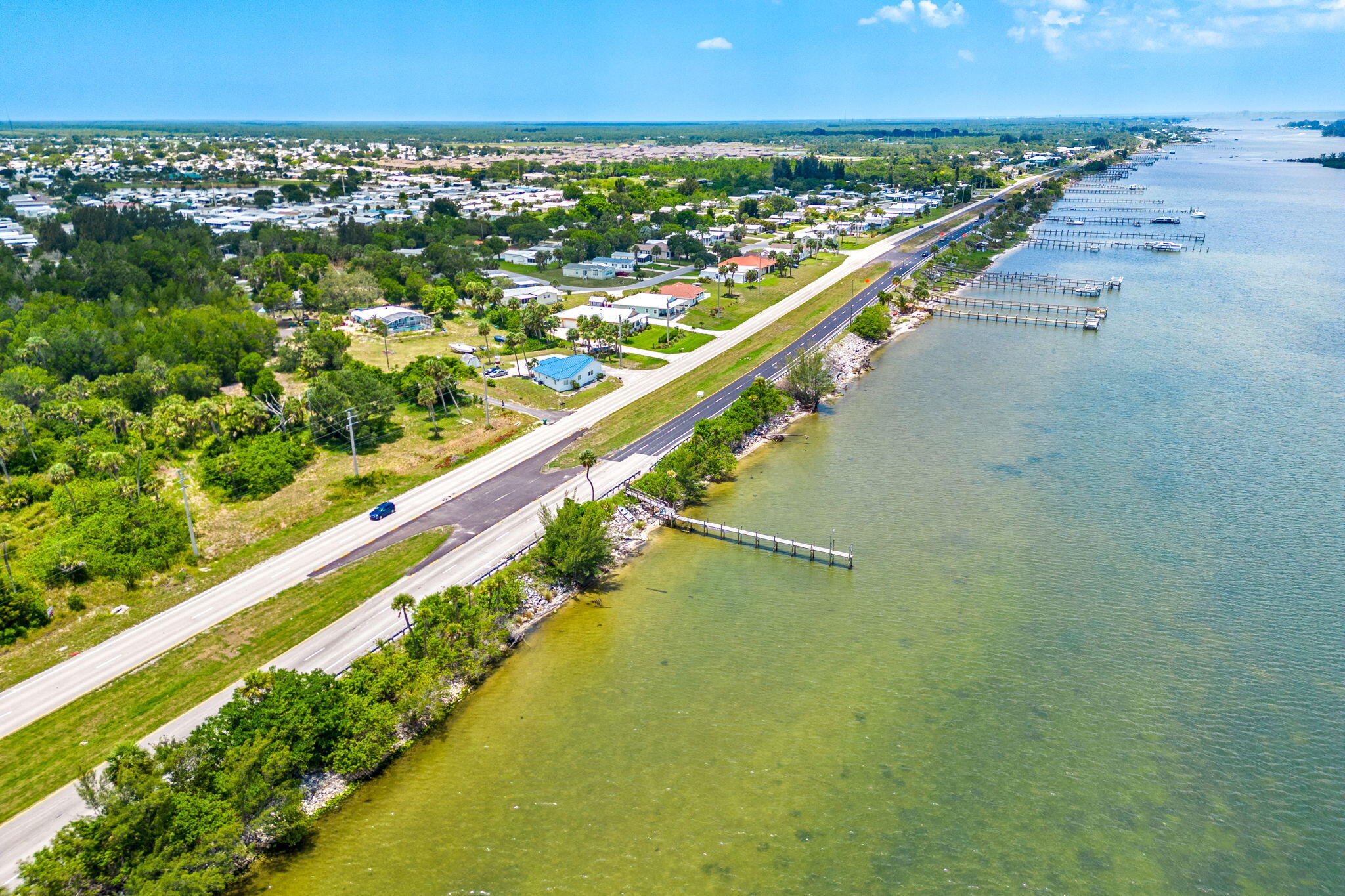 7680 Highway 1 Micco, FL 32976 - Photo 5 of 84 a view of a city skyline from a balcony
