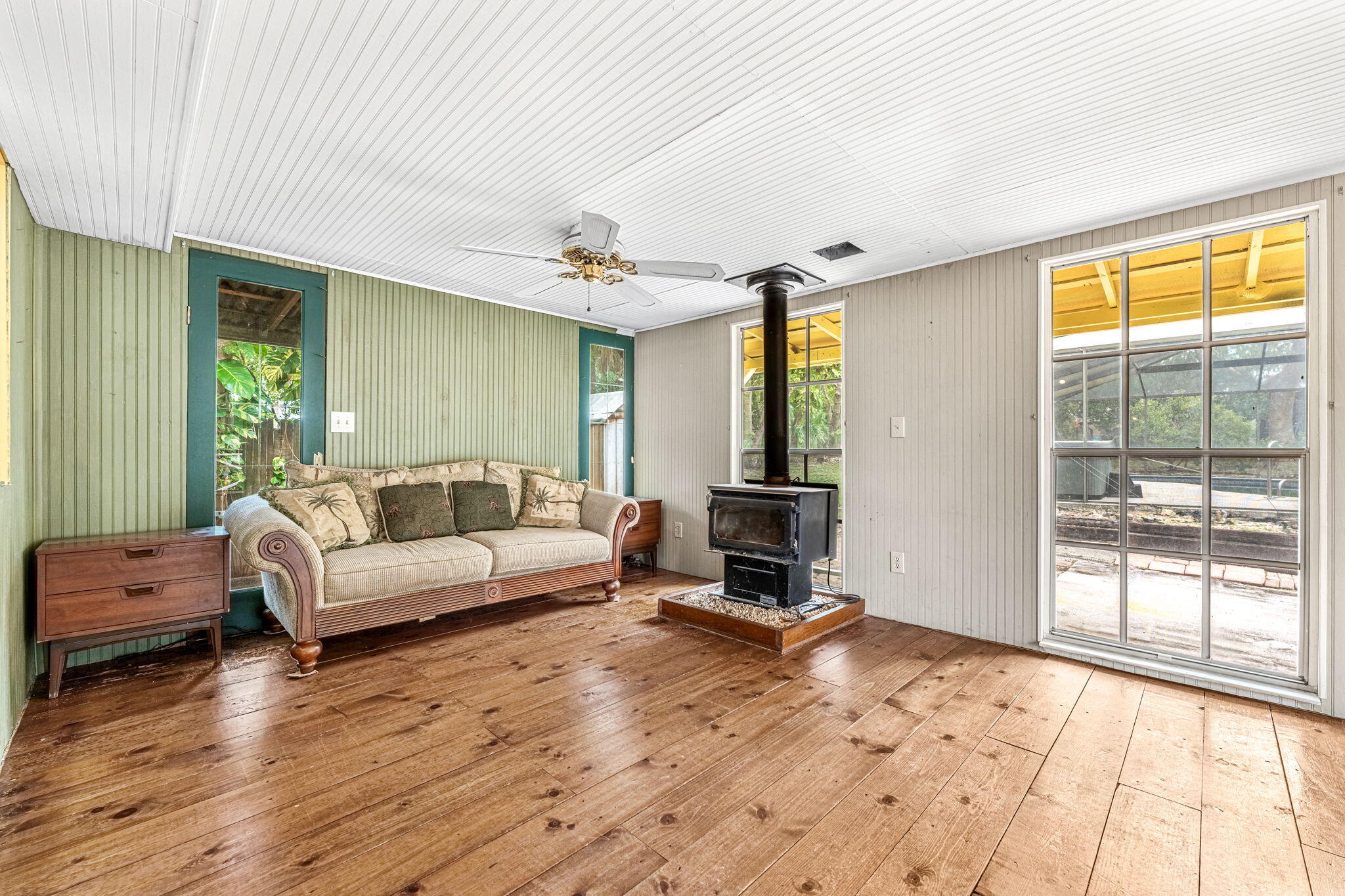 7680 Highway 1 Micco, FL 32976 - Photo 52 of 84 a living room with furniture and a large window