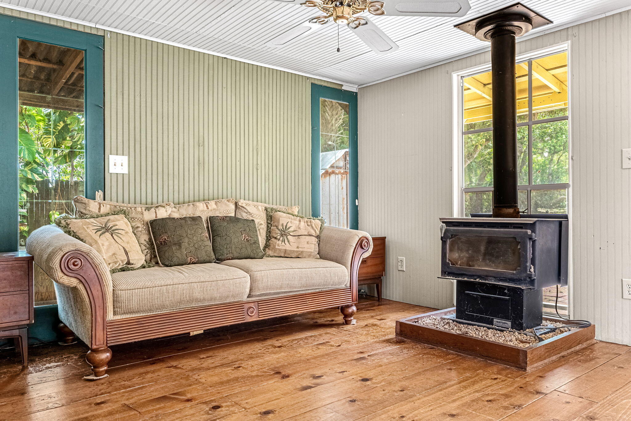 7680 Highway 1 Micco, FL 32976 - Photo 53 of 84 a living room with furniture and a fireplace