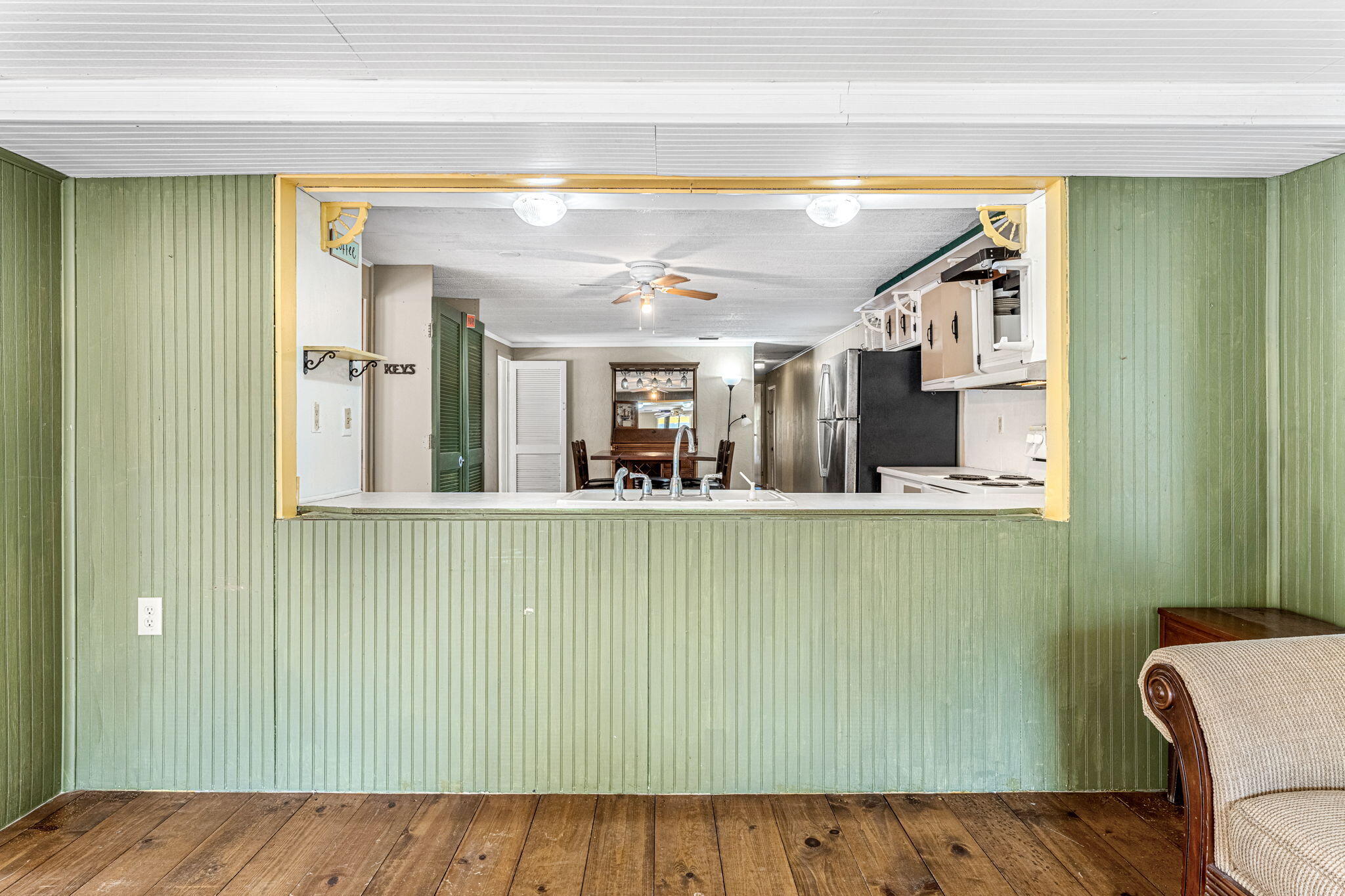 7680 Highway 1 Micco, FL 32976 - Photo 54 of 84 a view of kitchen with furniture and window