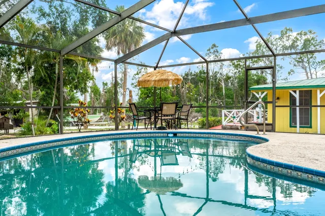 a view of a house with backyard
