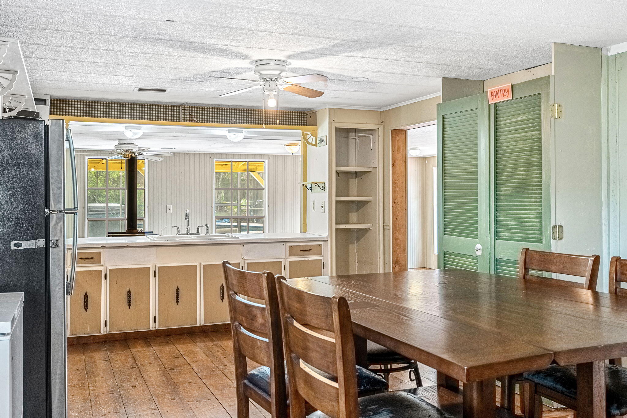 7680 Highway 1 Micco, FL 32976 - Photo 61 of 84 a view of a dining room with furniture and window