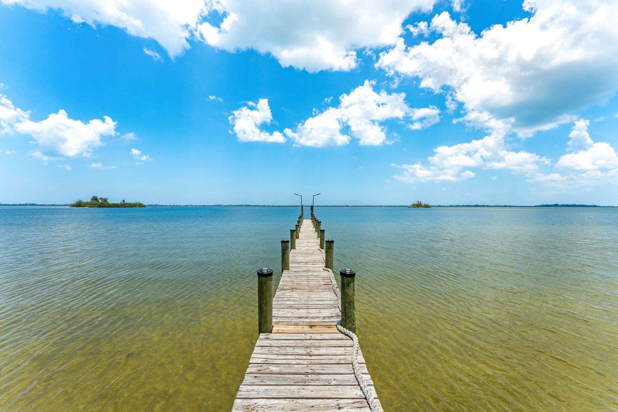 7680 Highway 1 Micco, FL 32976 - Photo 7 of 84 a front view of a house with a lake