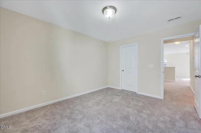 an empty room with an entryway
