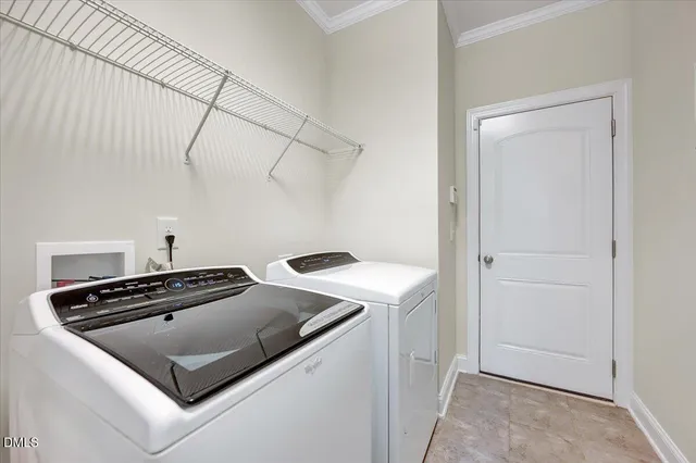 a kitchen that has a stove and a microwave