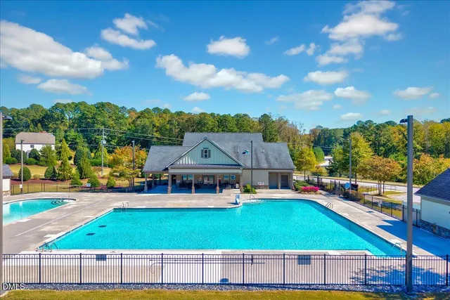 swimming pool with outdoor seating
