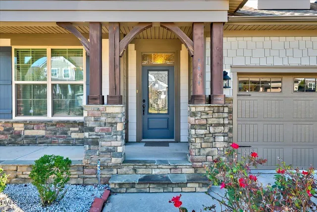 a front view of a house with a porch
