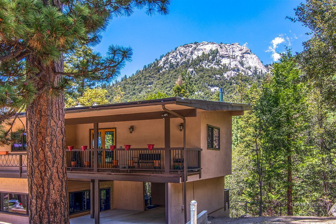55596 Encino Road Idyllwild, CA 92549 - Photo 2 of 74 a view of a car park in front of a house