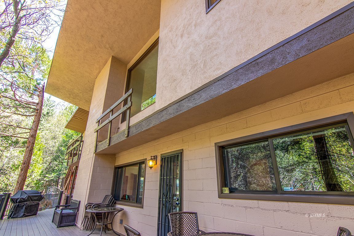 55596 Encino Road Idyllwild, CA 92549 - Photo 22 of 74 a view of a building from a balcony